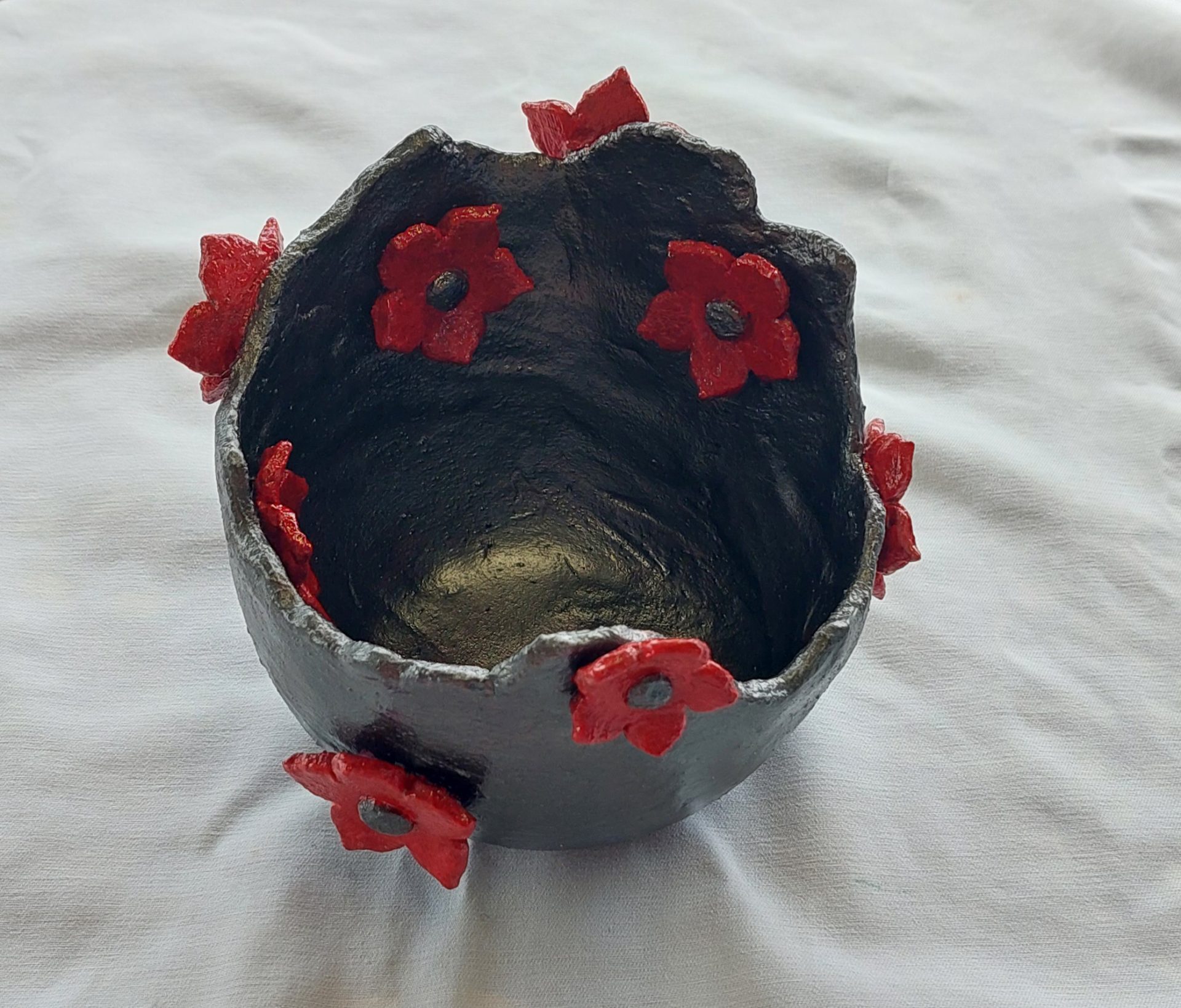 Pot deco aux fleurs rouges